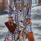 Smocked Round Neck Lantern Sleeve Midi Dress